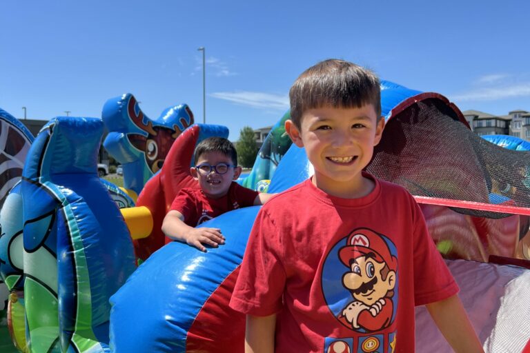 Jumping for joy in the bouncy castles.